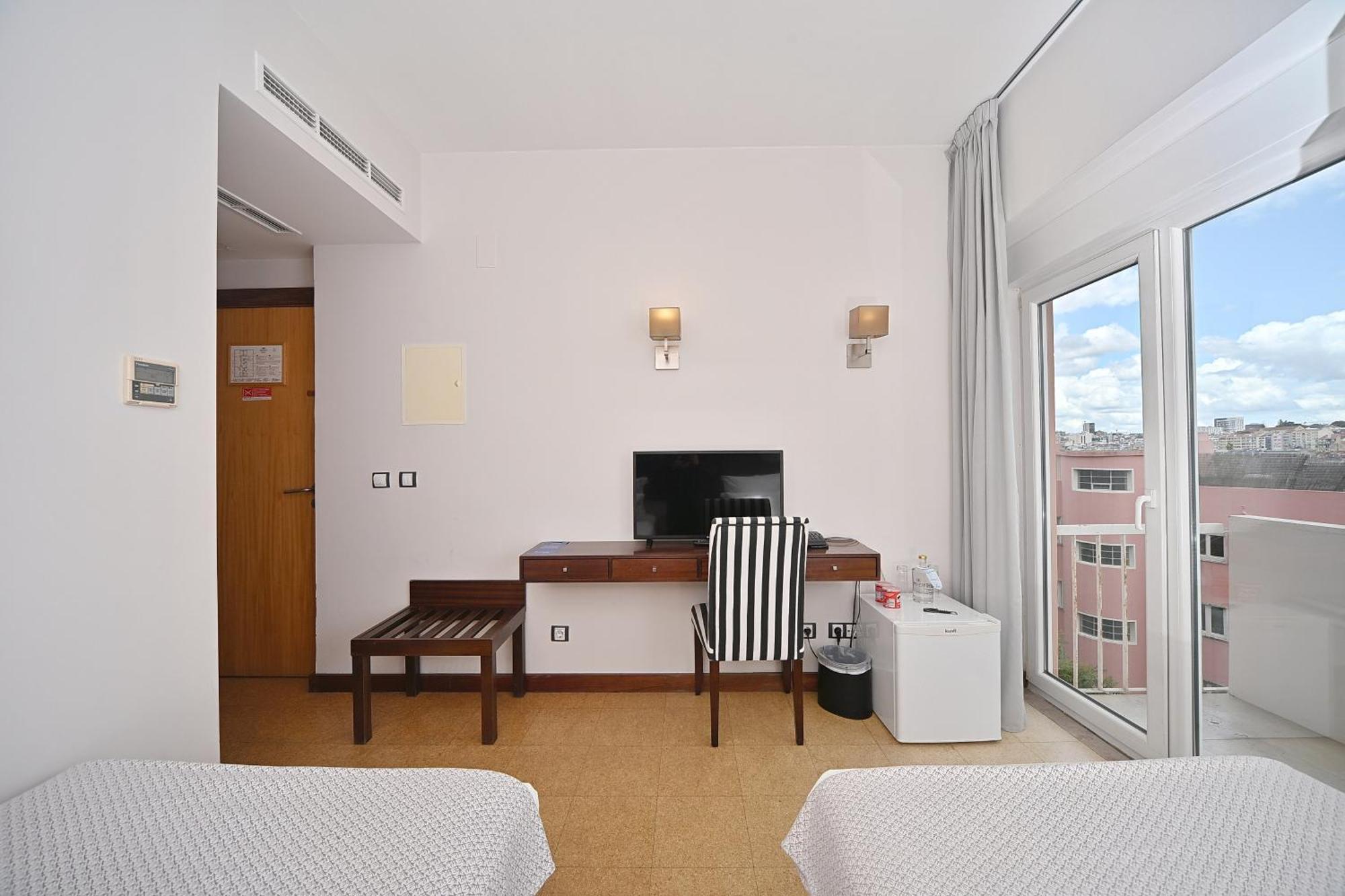 Chambre Deluxe Double ou Lits Jumeaux